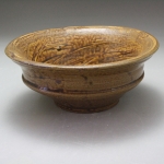 double curved yellow bowl