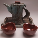 Teapot on Tray with Cups in front