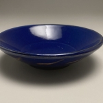 Slightly flat blue bowl
