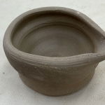 Wheel thrown pouring cup 
