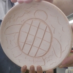 Scraffito plate turtle with waves