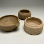 Two planters and pour bowl